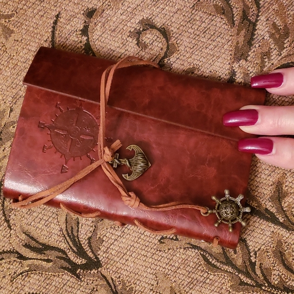 Beautiful Look of Leather Small Journal with Wrap around closure.